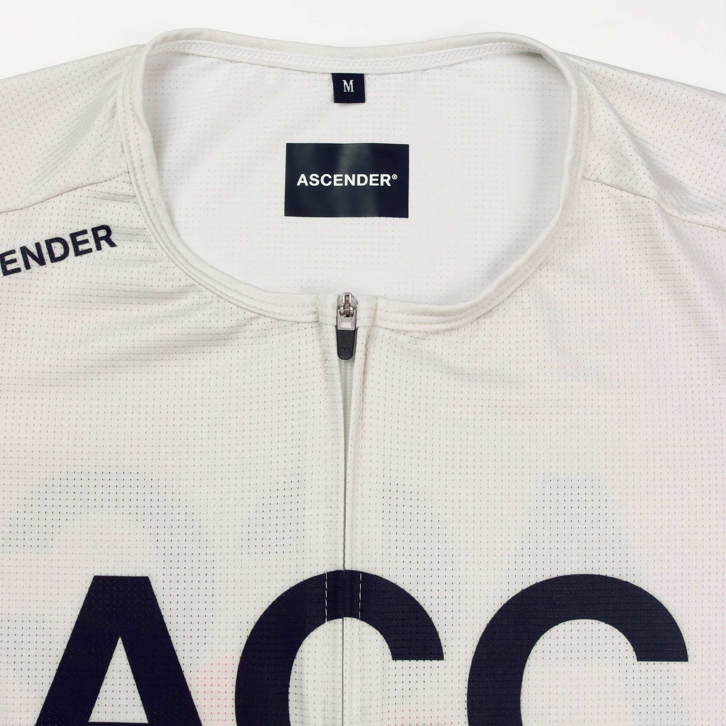ACC Pulse short sleeve cycling jersey in Clouds Dancer with orange-red swoosh, low aero collar close-up view