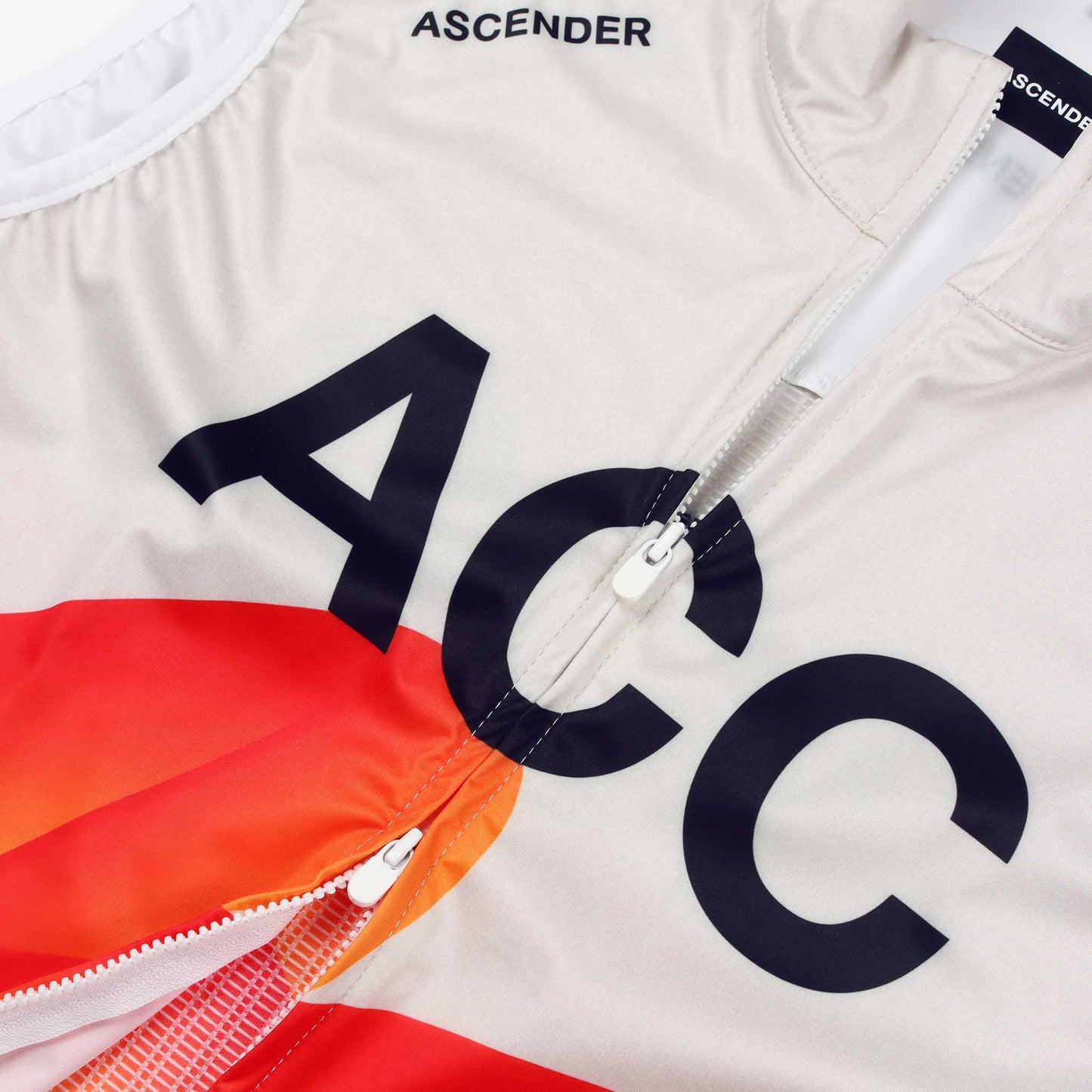 ACC Pulse wind vest back view in Clouds Dancer and Red-Orange Swoosh Dual YKK Zipper view