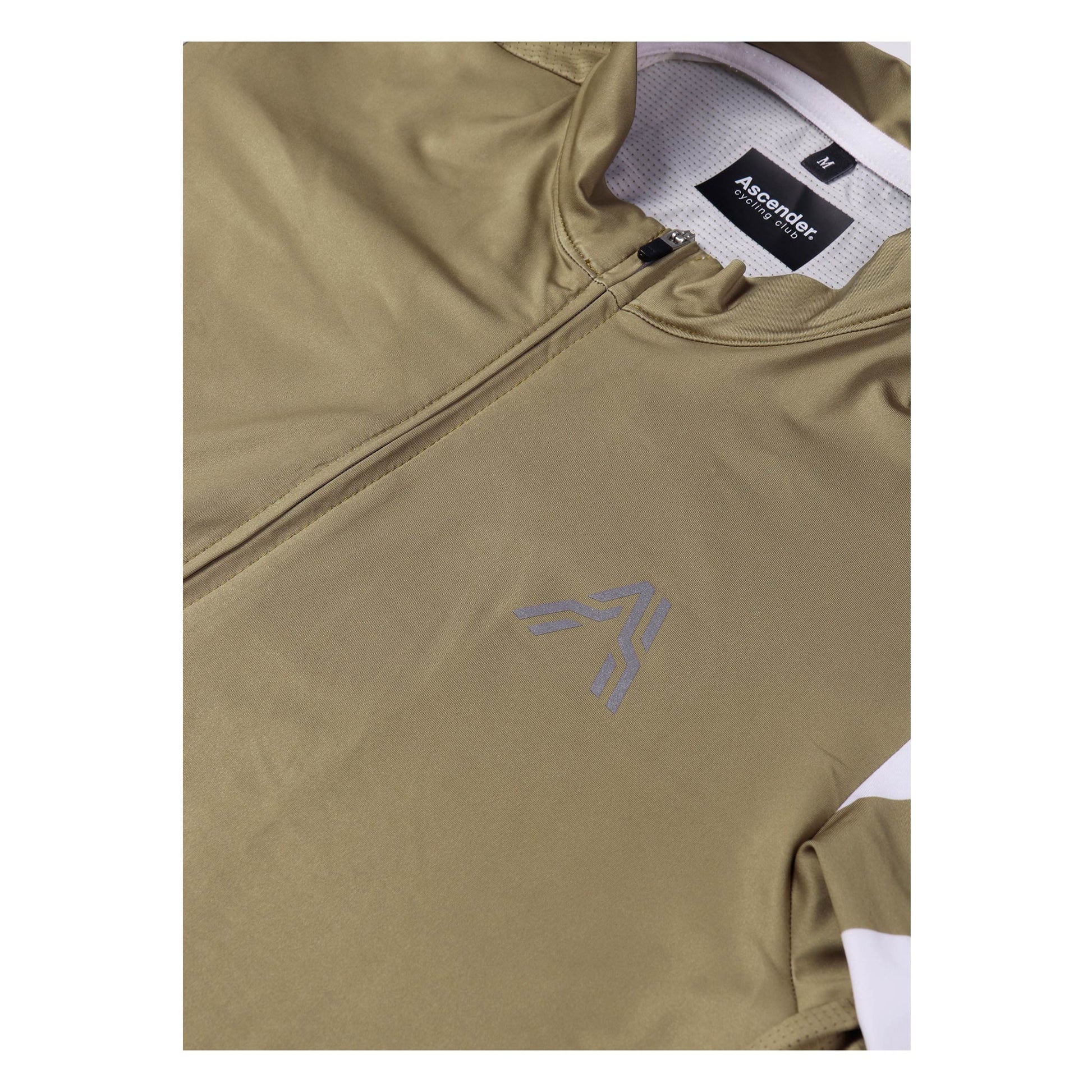 The retro-inspired Astro jersey Mystic Gold from Ascender Cycling Club Switzerland Frontside View & Reflective Logo