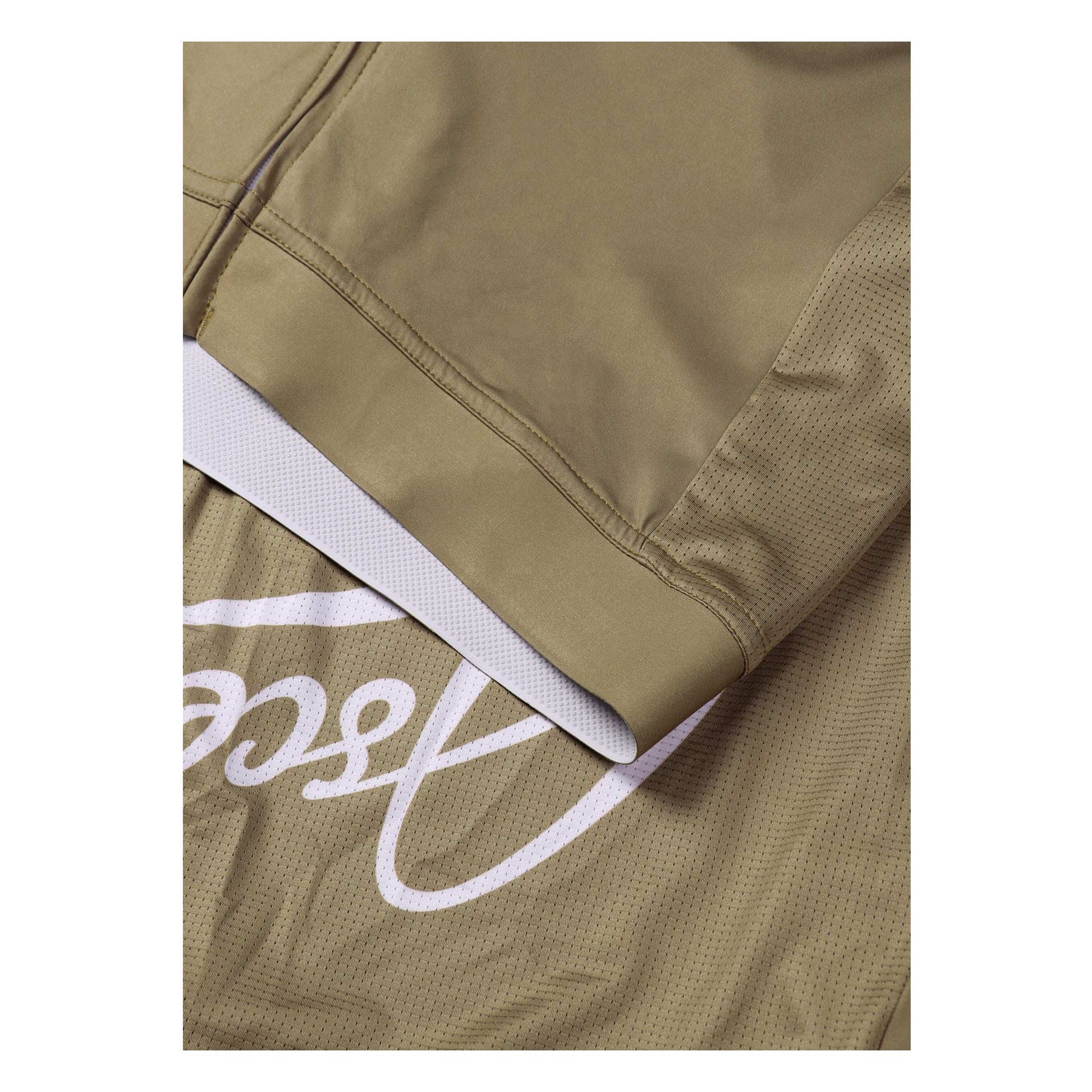 The retro-inspired Astro jersey Mystic Gold from Ascender Cycling Club Switzerland Elite Silicon Injected Waist Band View