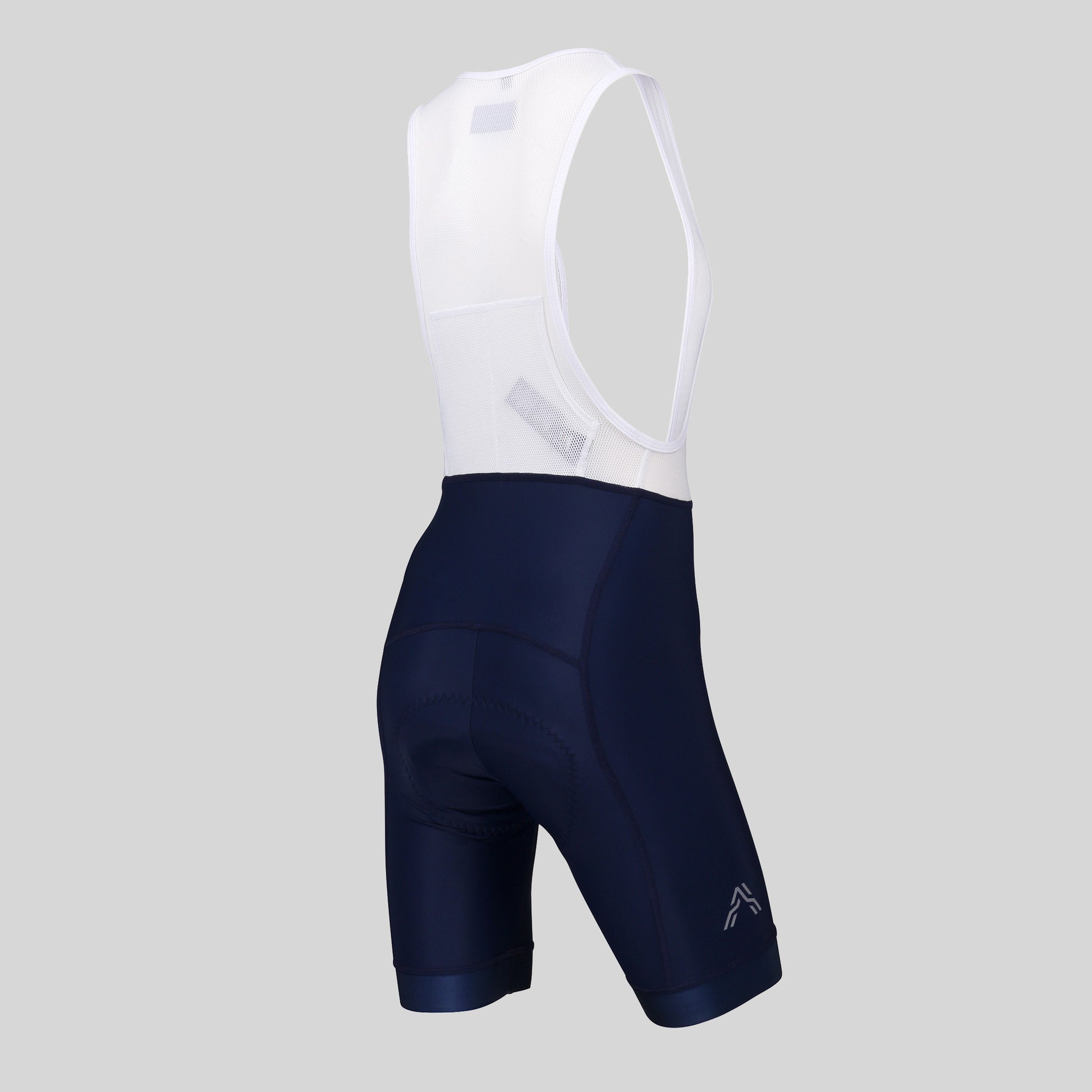 Epona Women Bib Short Navy by Ascender Cycling Club Zürich in Switzerland Front Right with Reflective Logo and Two Rear Cargo Pockets