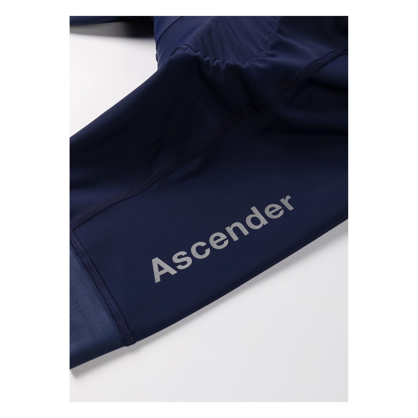 Epona Women Bib Short Navy by Ascender Cycling Club Zürich in Switzerland Front Left with Reflective Logos in Detailled View Ascender Logo Reflective