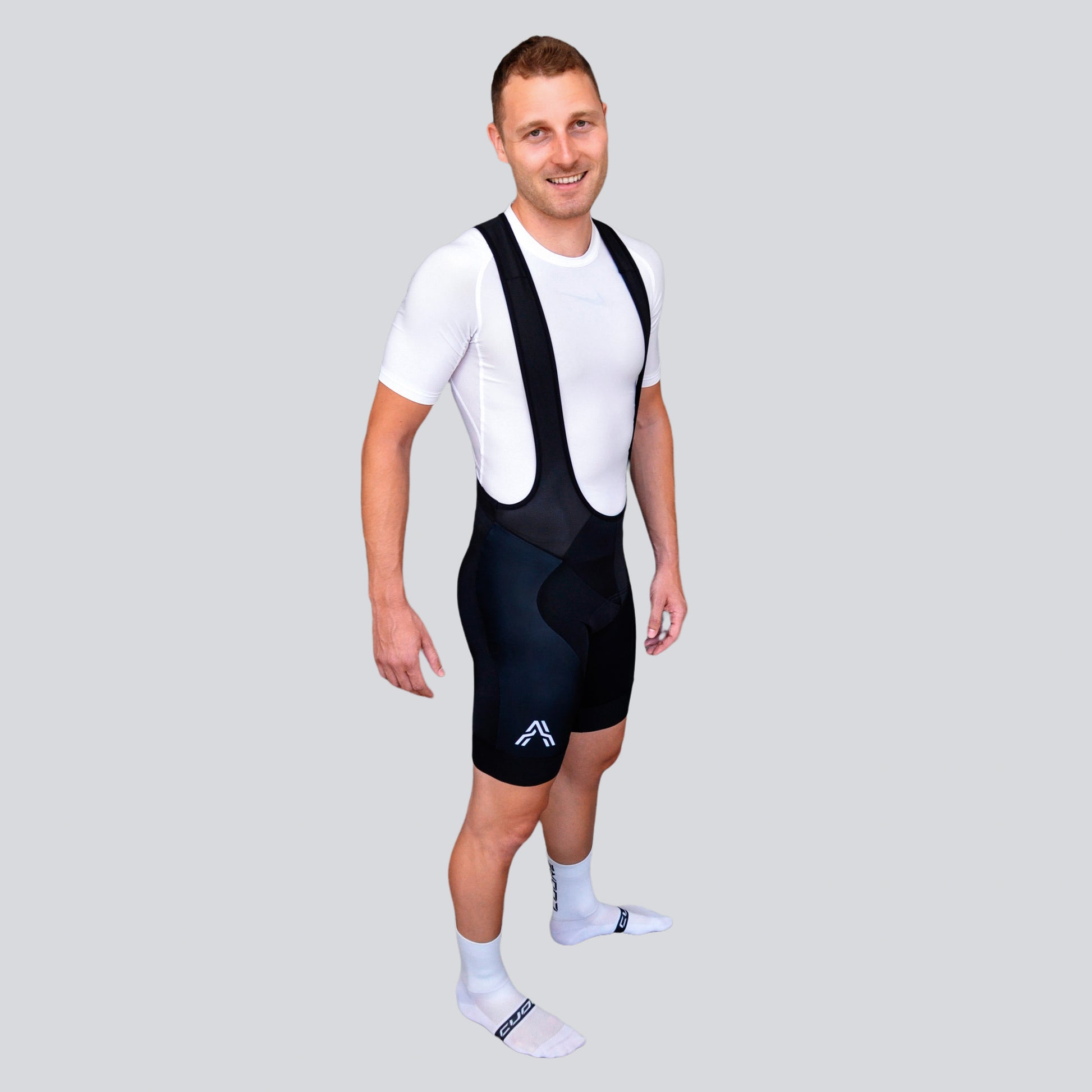 Classic Ascender Black Bib Short from Ascender Cycling Club Side View Zoom Monogram Ascender